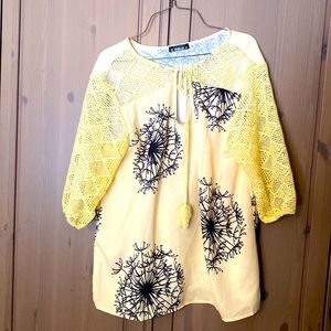 Silky blouse with lace arms and tie in front